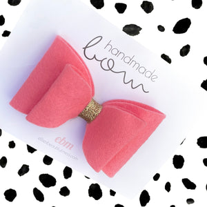 Coral handmade felt bow